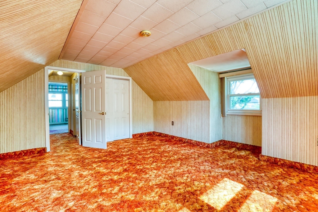 22 Crosby Street Stoneham, MA 02180 - Photo 20 of 30 a bedroom with a bed and a window