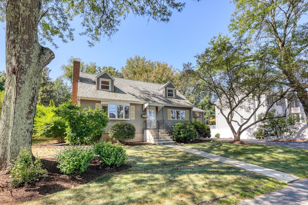 22 Crosby Street Stoneham, MA 02180 - Photo 2 of 30 a front view of a house with garden