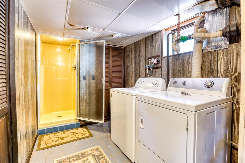 22 Crosby Street Stoneham, MA 02180 - Photo 24 of 30 a utility room with dryer and washer