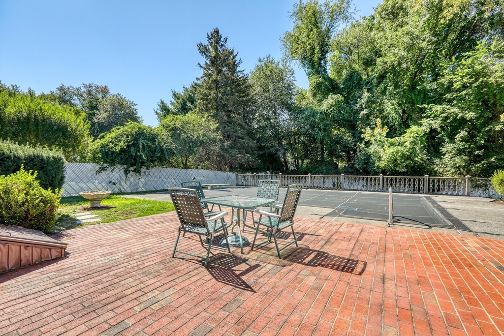 22 Crosby Street Stoneham, MA 02180 - Photo 25 of 30 a view of swimming pool with seating space