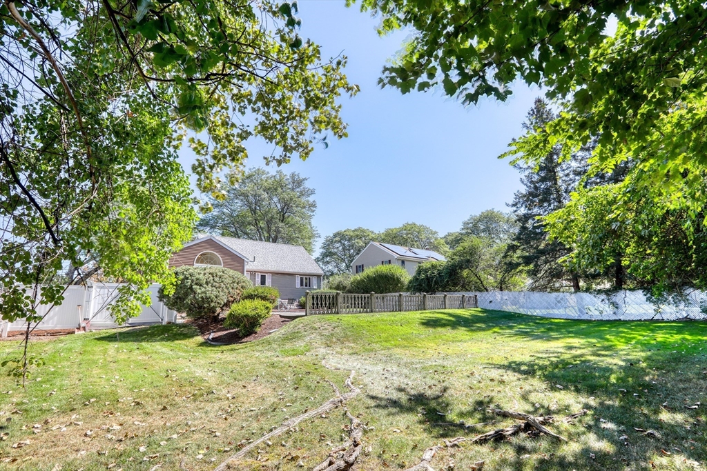 22 Crosby Street Stoneham, MA 02180 - Photo 28 of 30 a view of a house with a yard