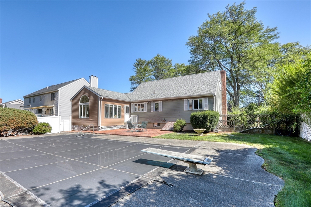 22 Crosby Street Stoneham, MA 02180 - Photo 29 of 30 a front view of a house with a yard