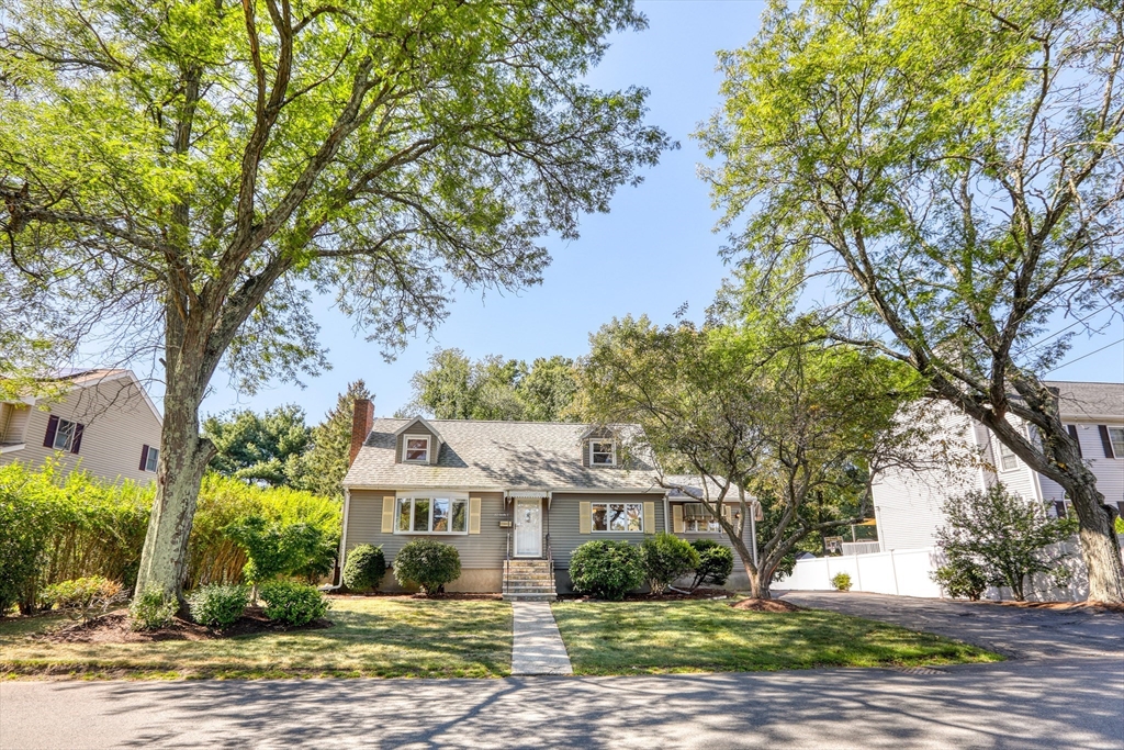 22 Crosby Street Stoneham, MA 02180 - Photo 30 of 30 a front view of a house with a garden