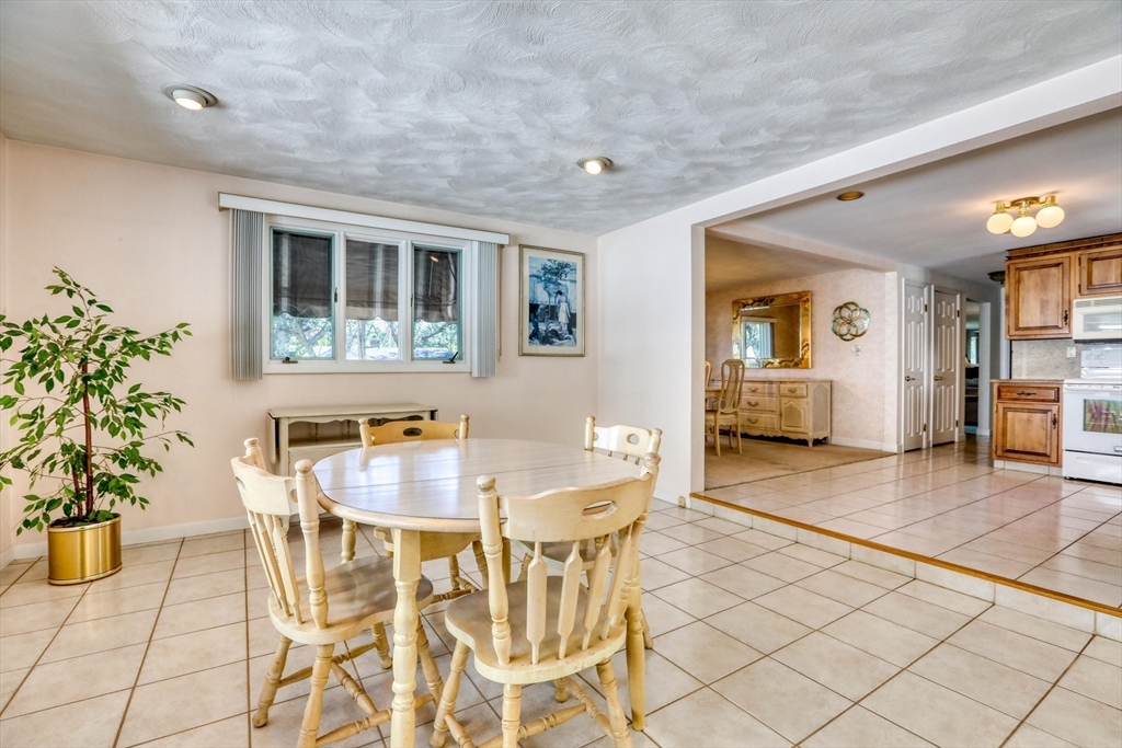 22 Crosby Street Stoneham, MA 02180 - Photo 8 of 30 a dining room with furniture and window