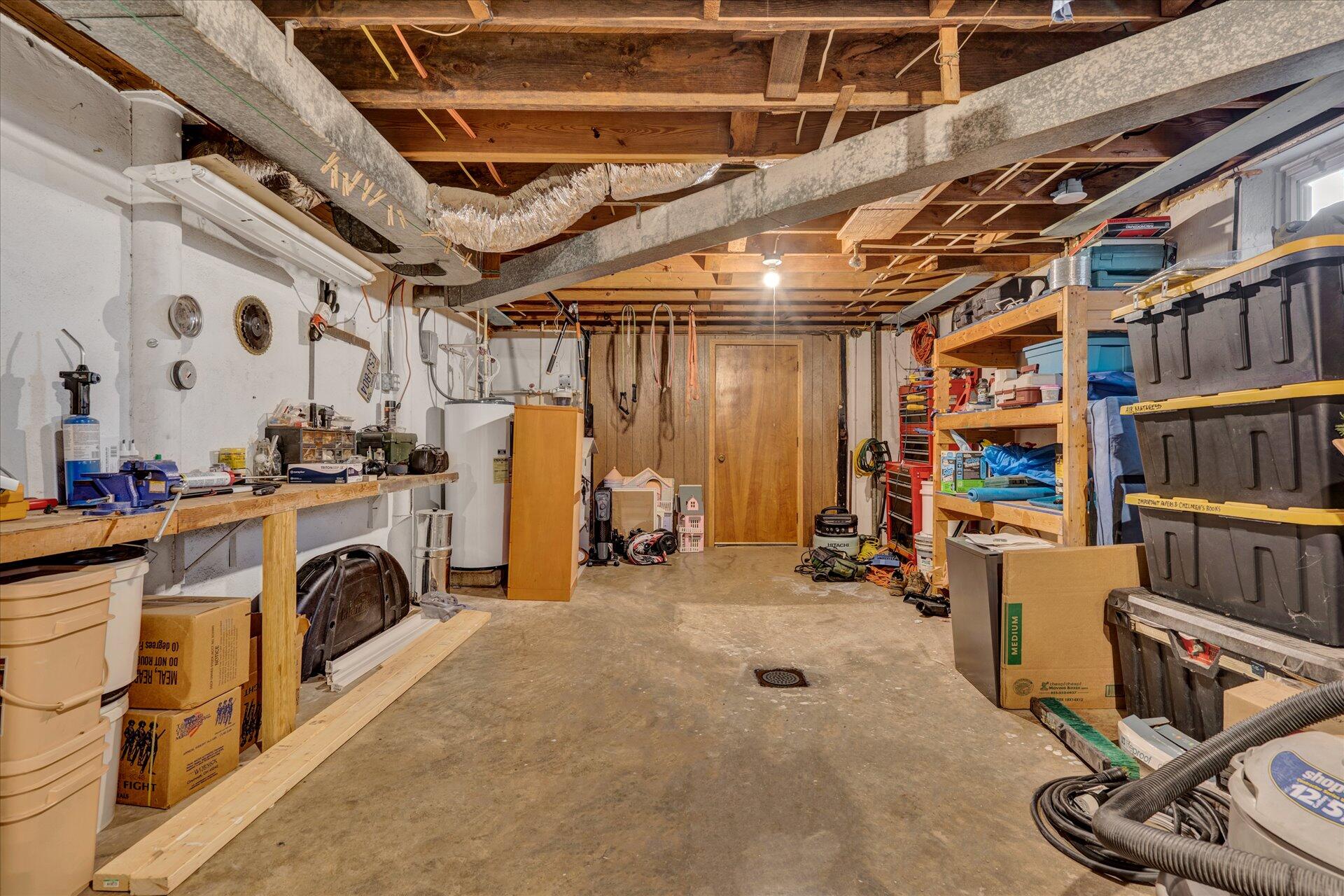 6298 Saunders Road Vinton, VA 24179 - Photo 13 of 31 a view of a storage with racks in a room