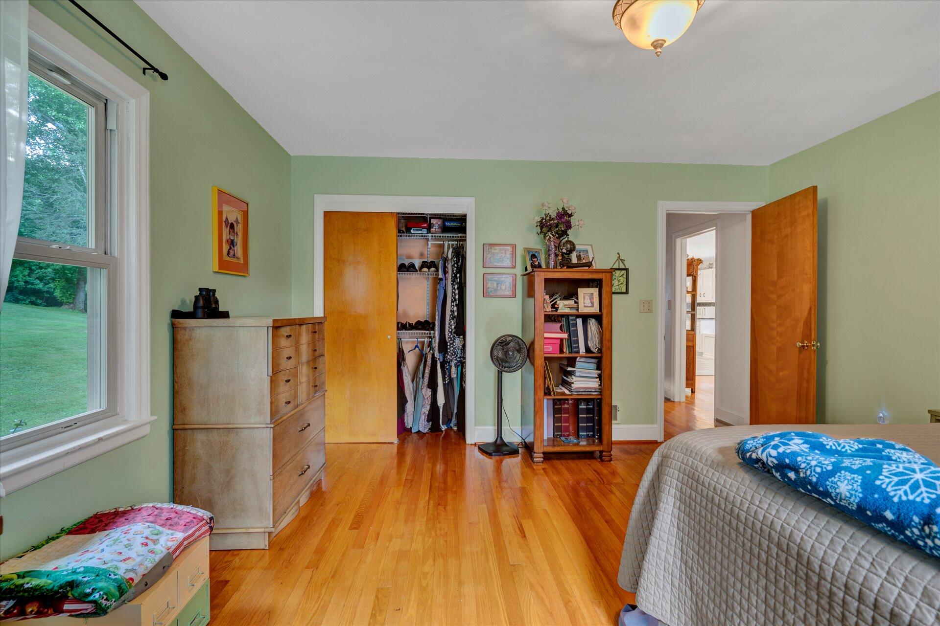 6298 Saunders Road Vinton, VA 24179 - Photo 23 of 31 a bed room with a bed and a window