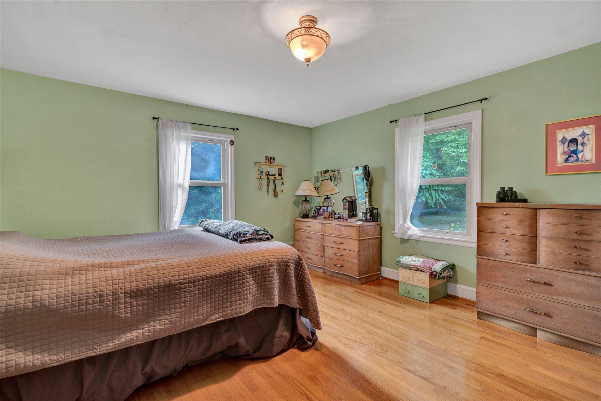 6298 Saunders Road Vinton, VA 24179 - Photo 24 of 31 a bedroom with a bed and a dresser
