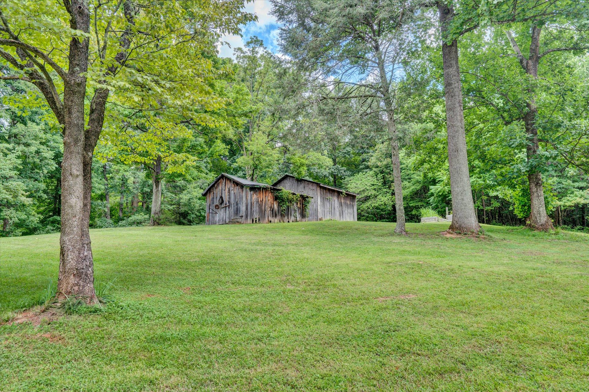 6298 Saunders Road Vinton, VA 24179 - Photo 10 of 31 a view of a big yard with large trees