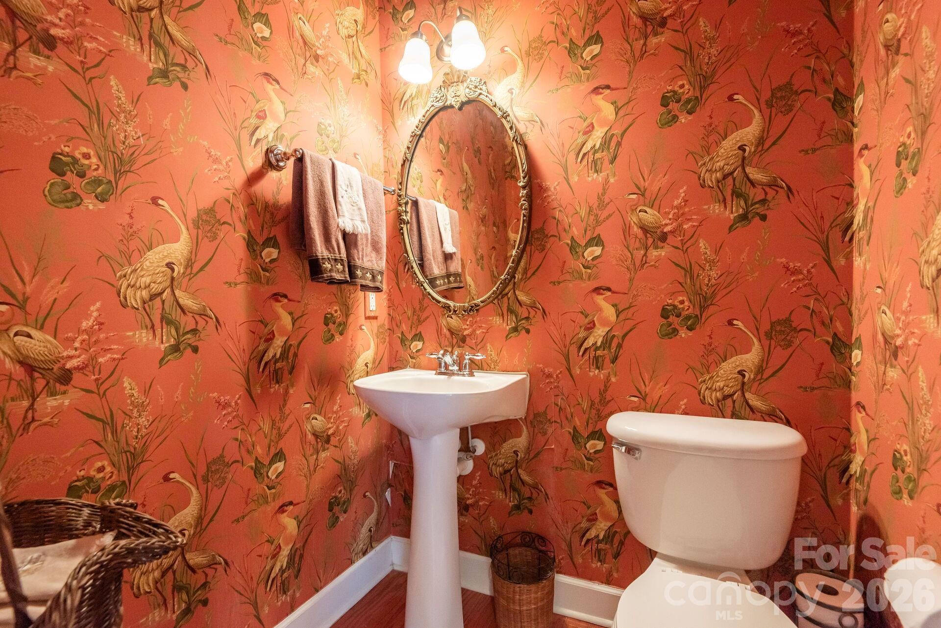 8124 Oratorio Place Charlotte, NC 28270 - Photo 21 of 38 a bathroom with a toilet and sink