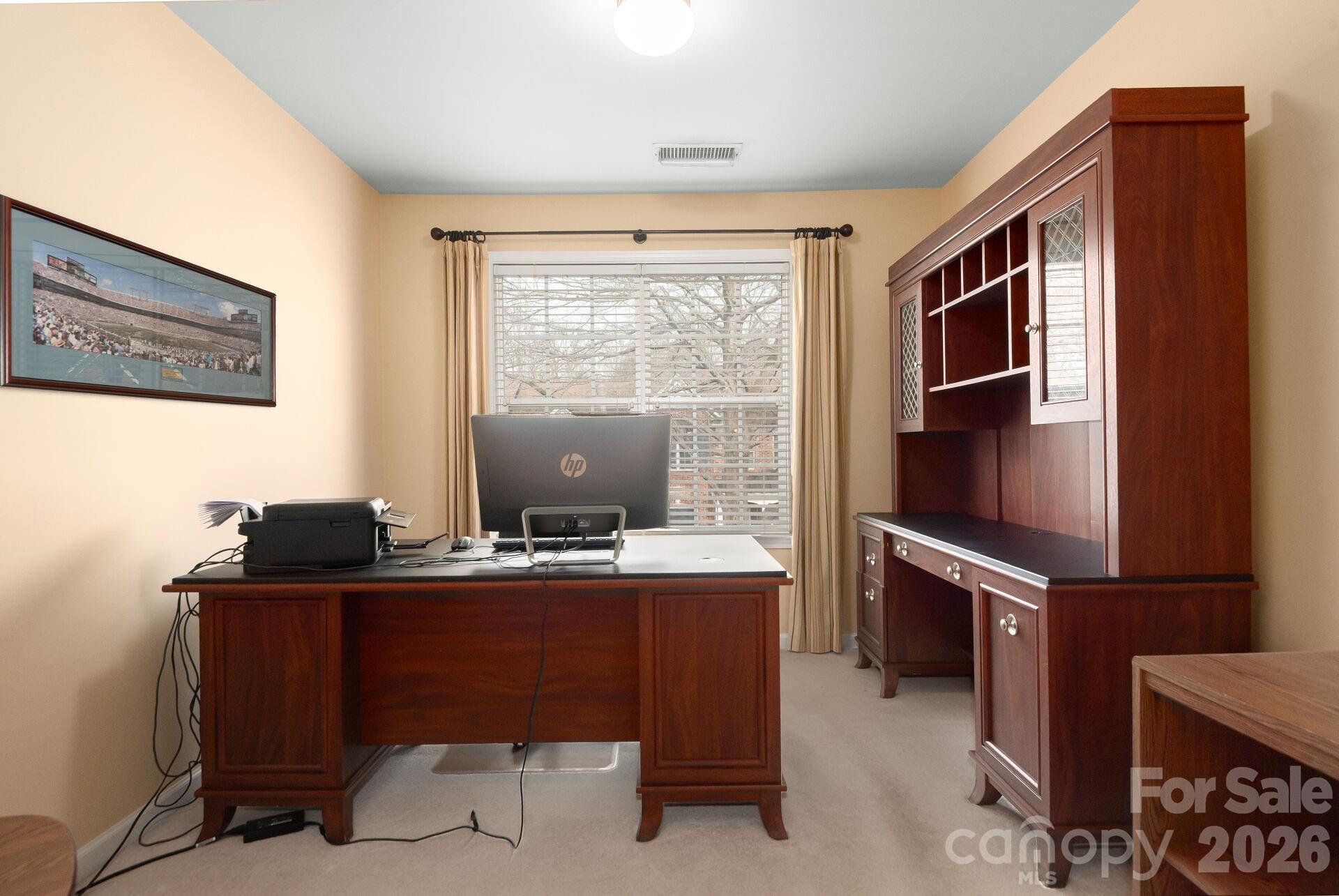 8124 Oratorio Place Charlotte, NC 28270 - Photo 25 of 38 a view of a workspace with furniture
