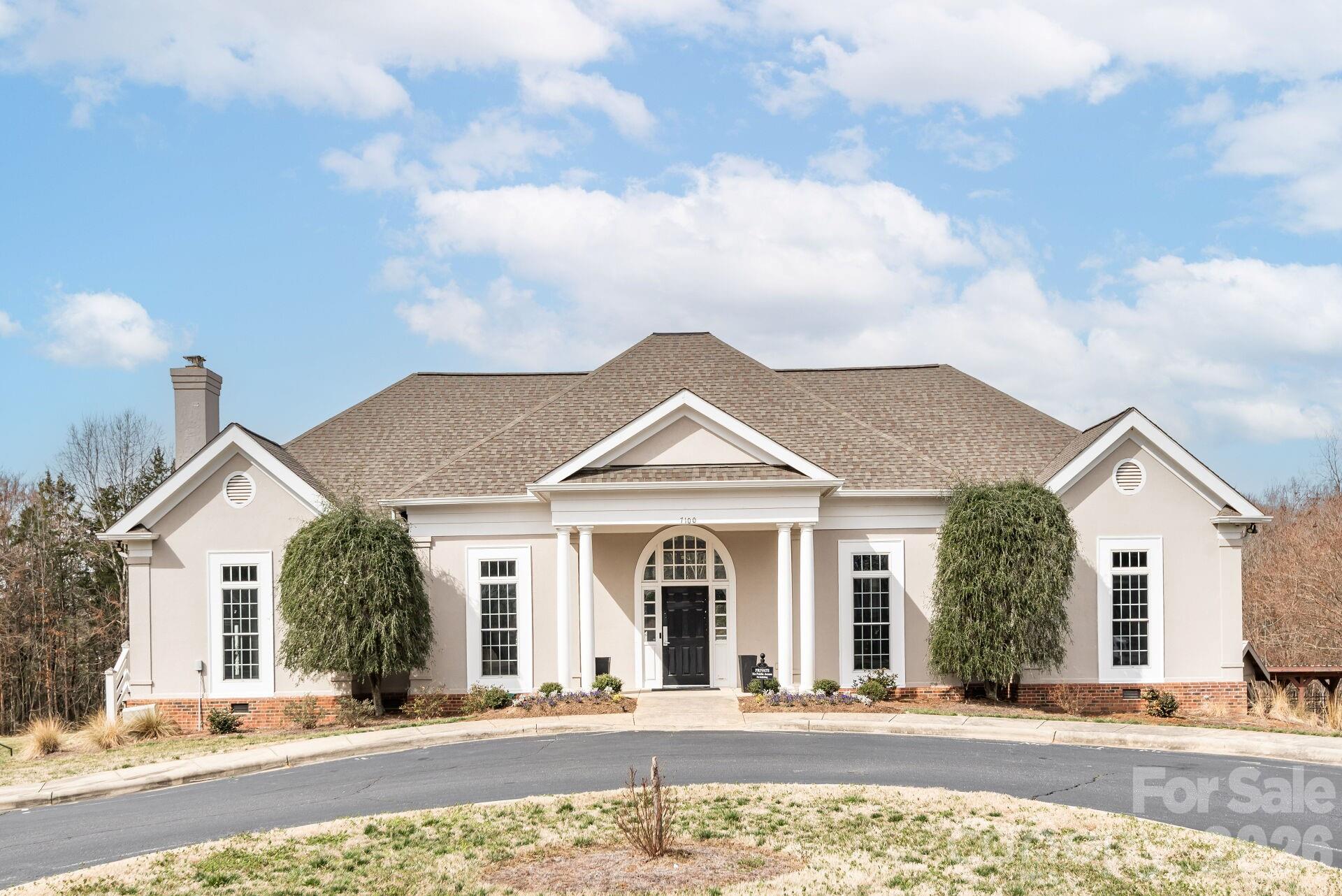 8124 Oratorio Place Charlotte, NC 28270 - Photo 38 of 38 front view of a house with a pathway