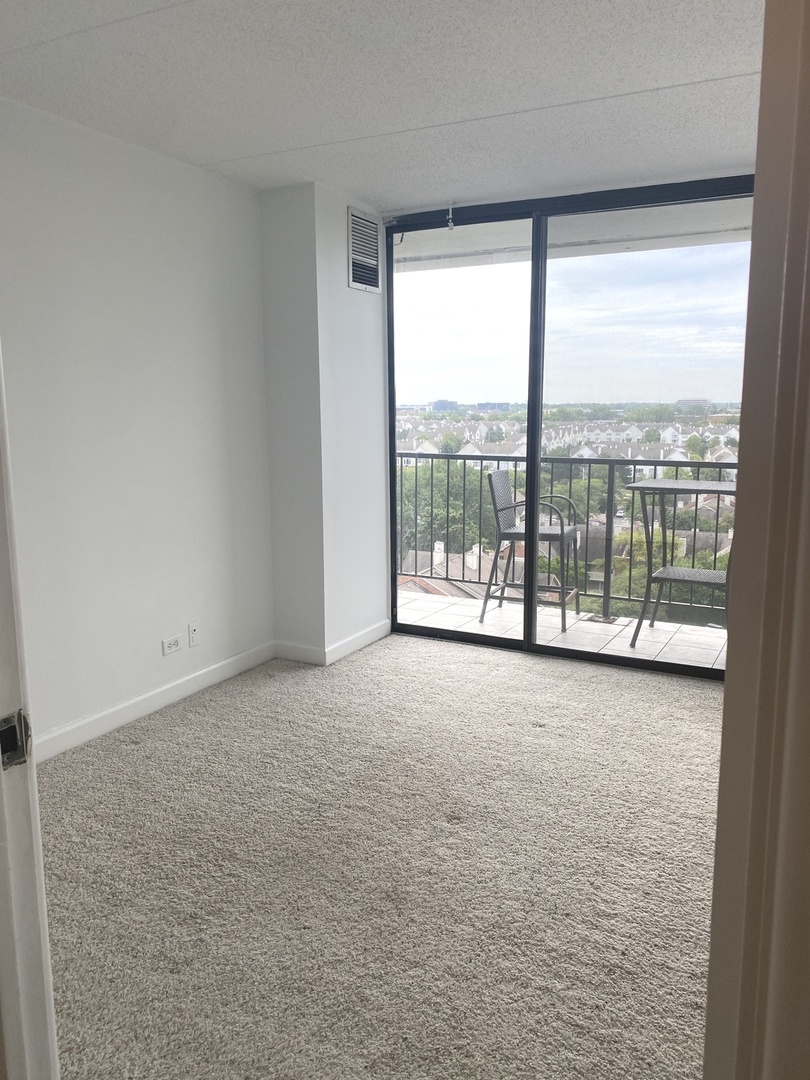 2015 South Finley Road, Unit 1101 Lombard, IL 60148 - Photo 11 of 24 a view of a room with large windows