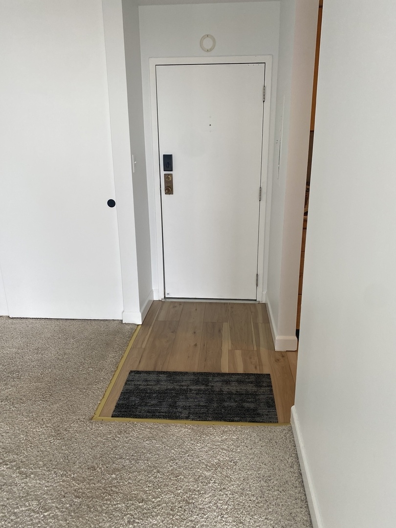 2015 South Finley Road, Unit 1101 Lombard, IL 60148 - Photo 15 of 24 a room with window and hardwood floor