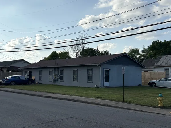 a view of a house with a garden
