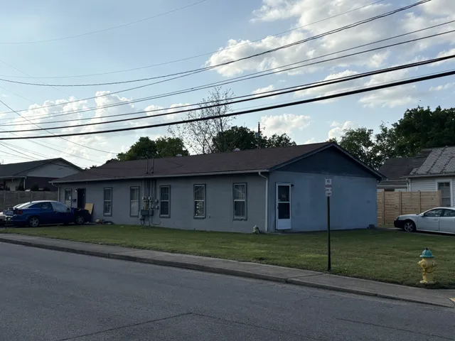 a view of a house with a garden