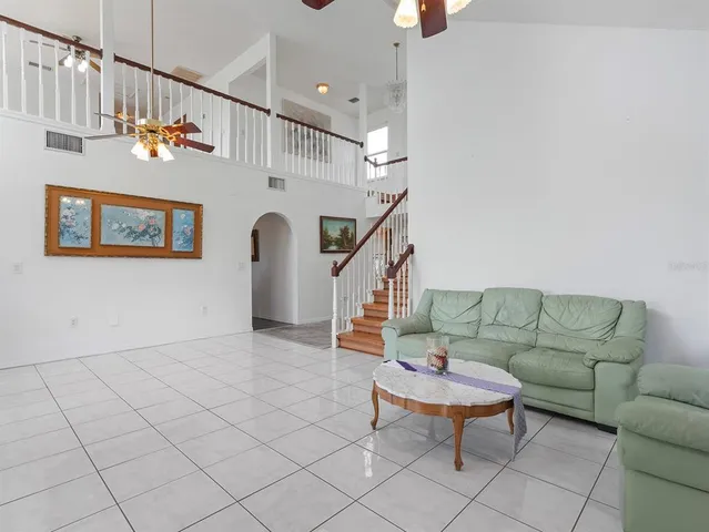 a kitchen with stainless steel appliances a refrigerator stove microwave and cabinets