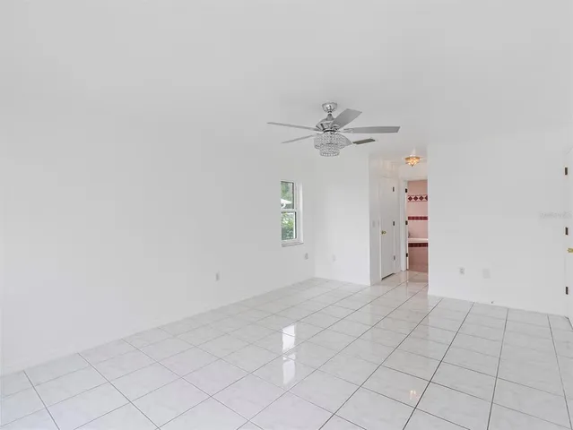 a bathroom with a toilet a sink and a mirror