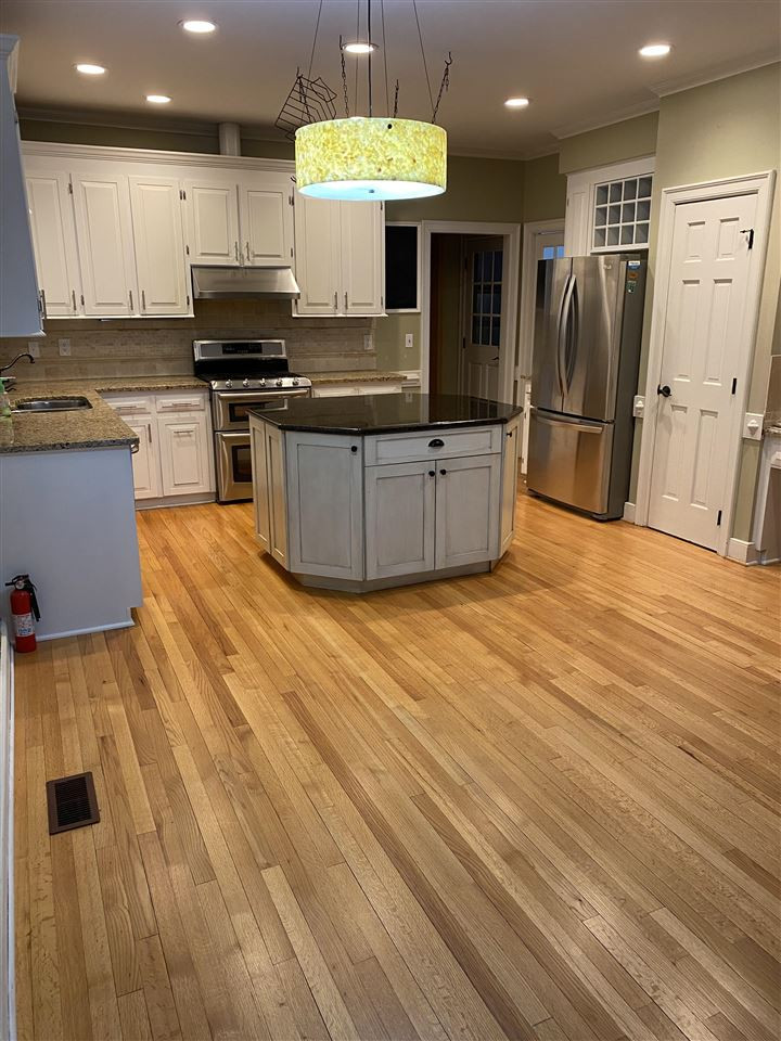 2008 Tiverton Court Raleigh, NC 27615 - Photo 2 of 30 Open kitchen with pot rack