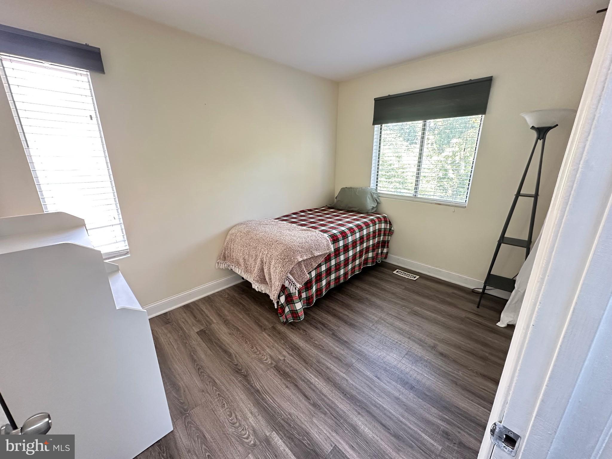 1745 Ridgely Road Edgewater, MD 21037 - Photo 18 of 43 a room with a bed and a window