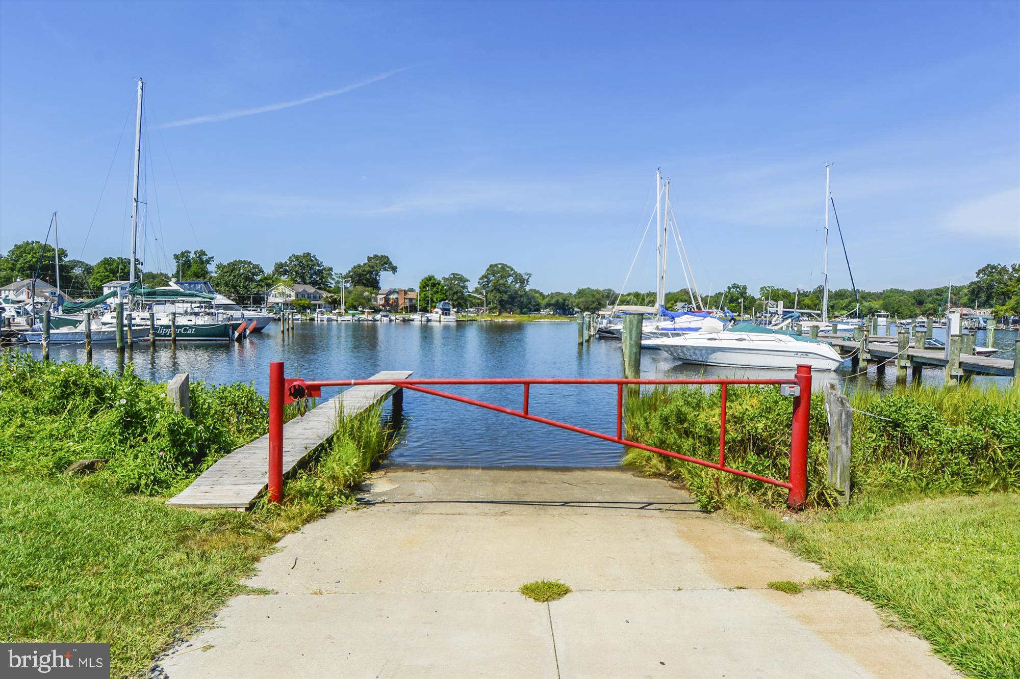 1745 Ridgely Road Edgewater, MD 21037 - Photo 33 of 43 a view of a lake with a big yard and a large mountain view