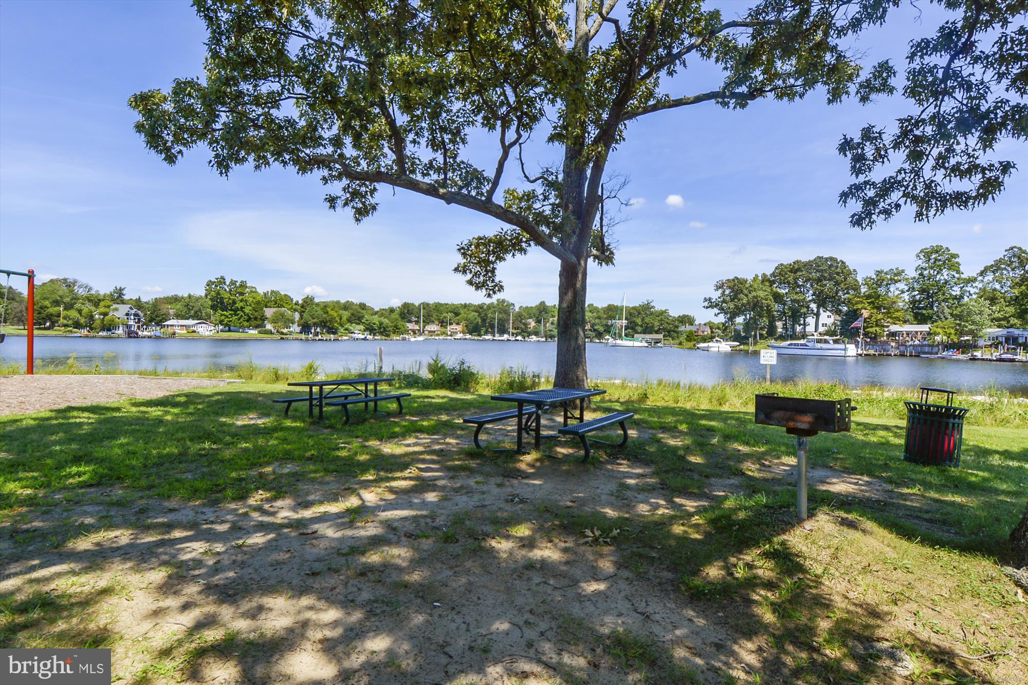 1745 Ridgely Road Edgewater, MD 21037 - Photo 35 of 43 a view of a lake with houses in the back
