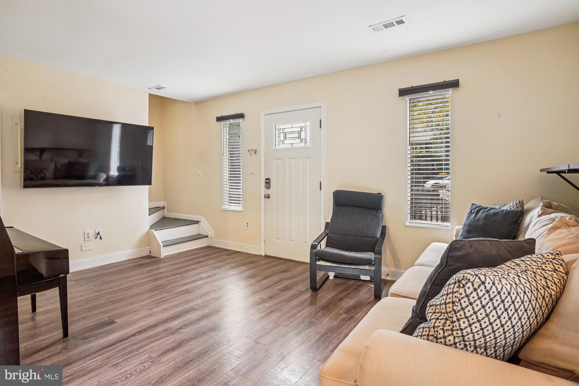 1745 Ridgely Road Edgewater, MD 21037 - Photo 6 of 43 a living room with furniture and a flat screen tv