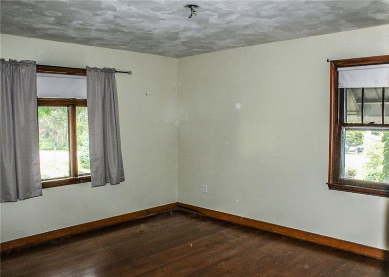 1220 Ridge Road Ambridge, PA 15003 - Photo 11 of 22 The maser bedroom has a large, walk-in closet.