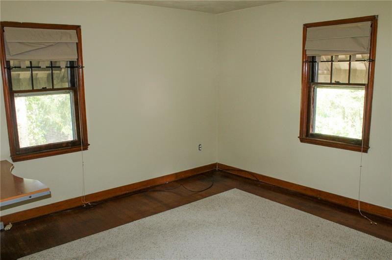 1220 Ridge Road Ambridge, PA 15003 - Photo 12 of 22 Bedroom 2 is spacious with plenty of light.