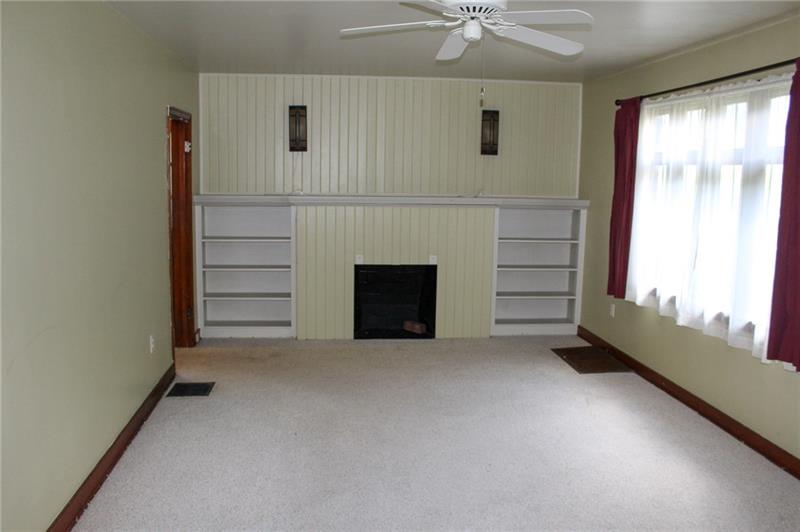 1220 Ridge Road Ambridge, PA 15003 - Photo 3 of 22 Family room features wonderful built-ins.