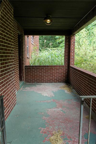 1220 Ridge Road Ambridge, PA 15003 - Photo 22 of 22 The large side porch is a great place to sit and enjoy your surroundings.