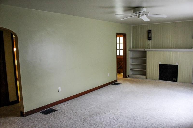 1220 Ridge Road Ambridge, PA 15003 - Photo 4 of 22 The family room is spacious, allowing for many options