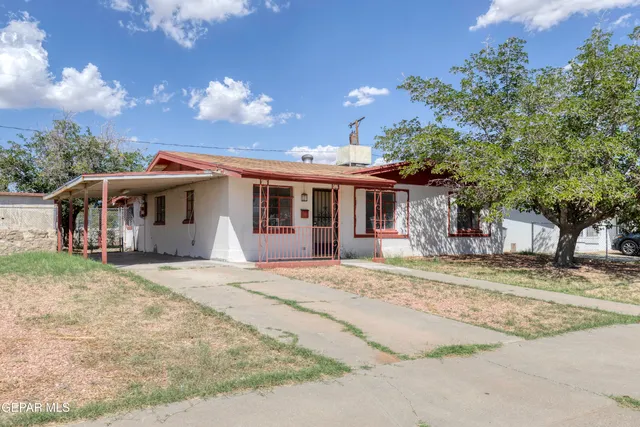 front view of a house with a patio