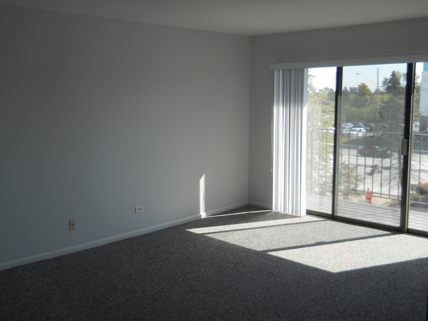 104 Steeple Drive, Unit F Buffalo Grove, IL 60089 - Photo 2 of 11 a view of a room with large windows
