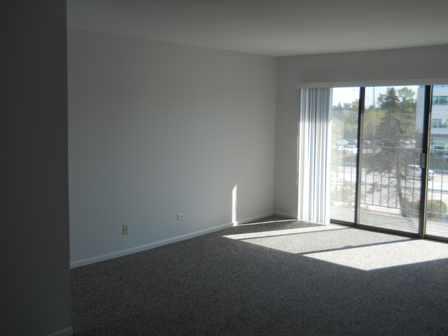 104 Steeple Drive, Unit F Buffalo Grove, IL 60089 - Photo 4 of 11 a view of a room with large windows