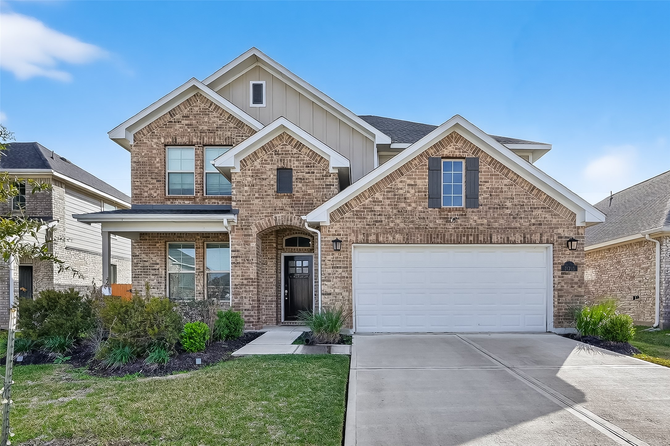 31215 Conover Drive Fulshear, TX 77441 - Photo 1 of 42 a front view of a house with garden