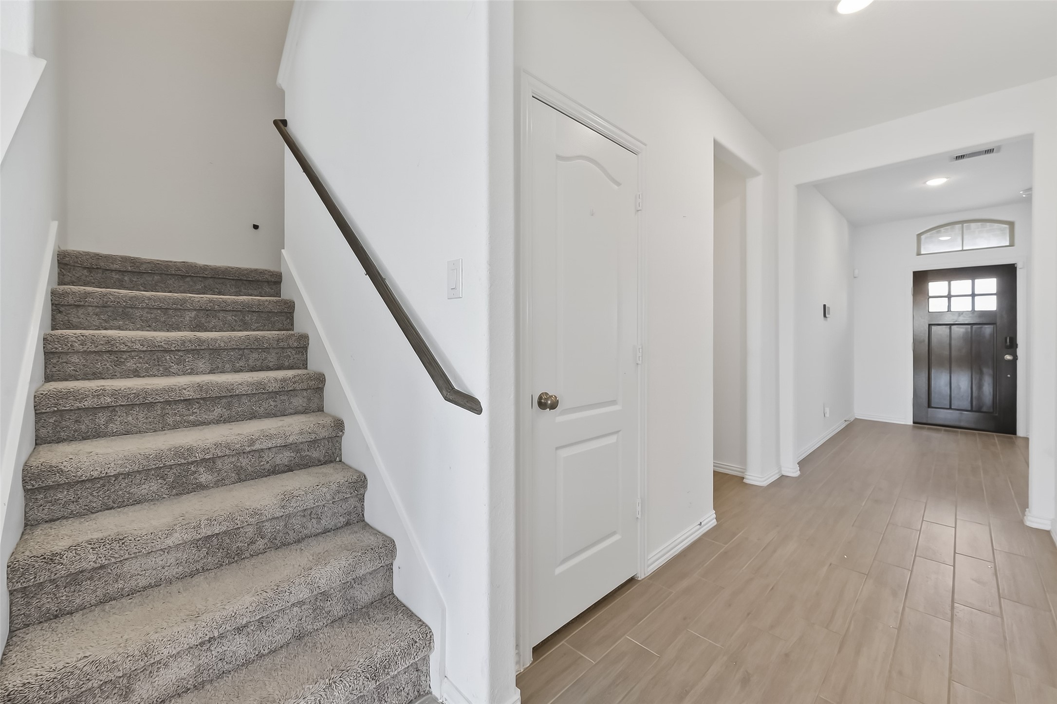 31215 Conover Drive Fulshear, TX 77441 - Photo 14 of 42 a view of entryway with wooden floor