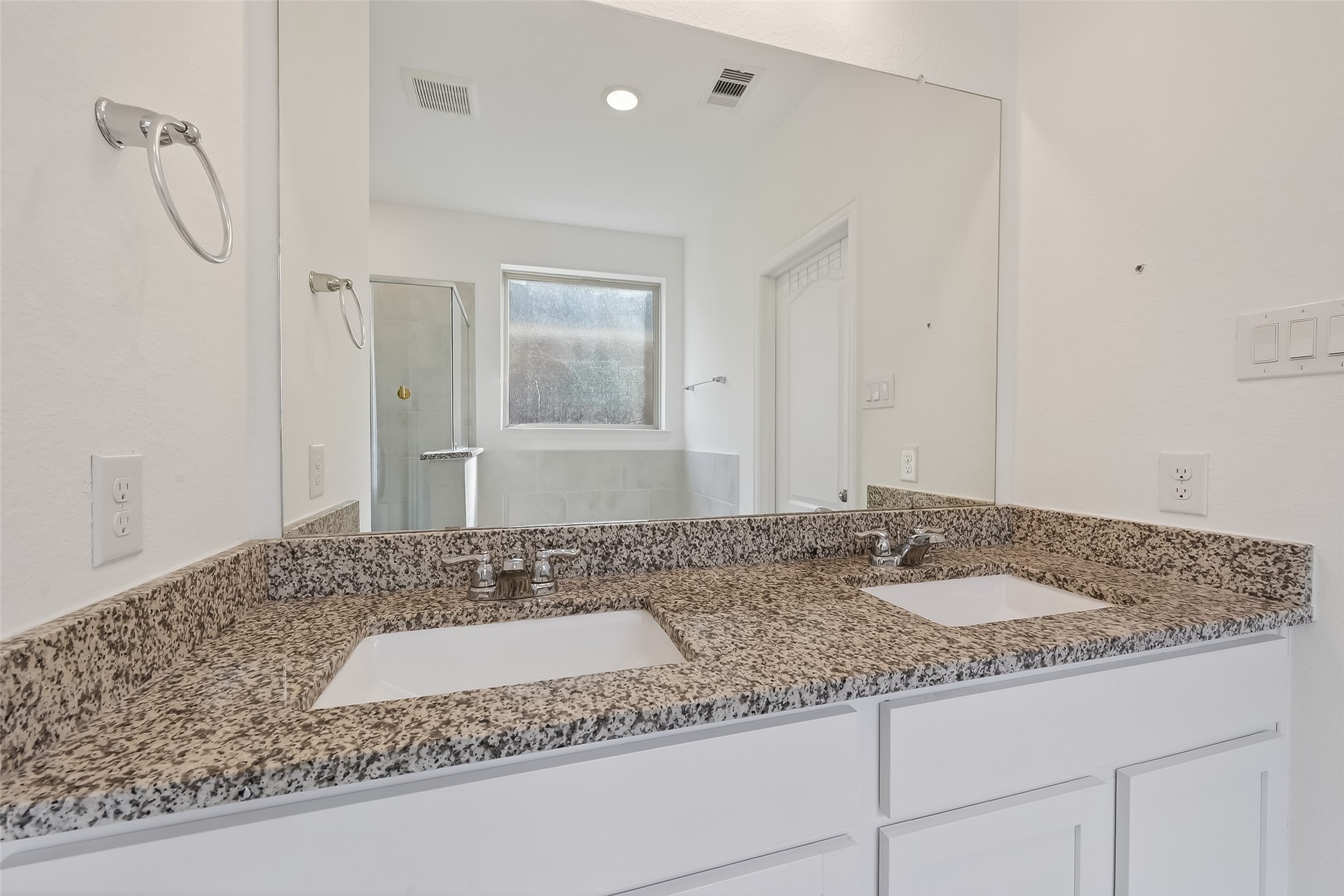 31215 Conover Drive Fulshear, TX 77441 - Photo 29 of 42 a bathroom with a granite countertop sink and a mirror