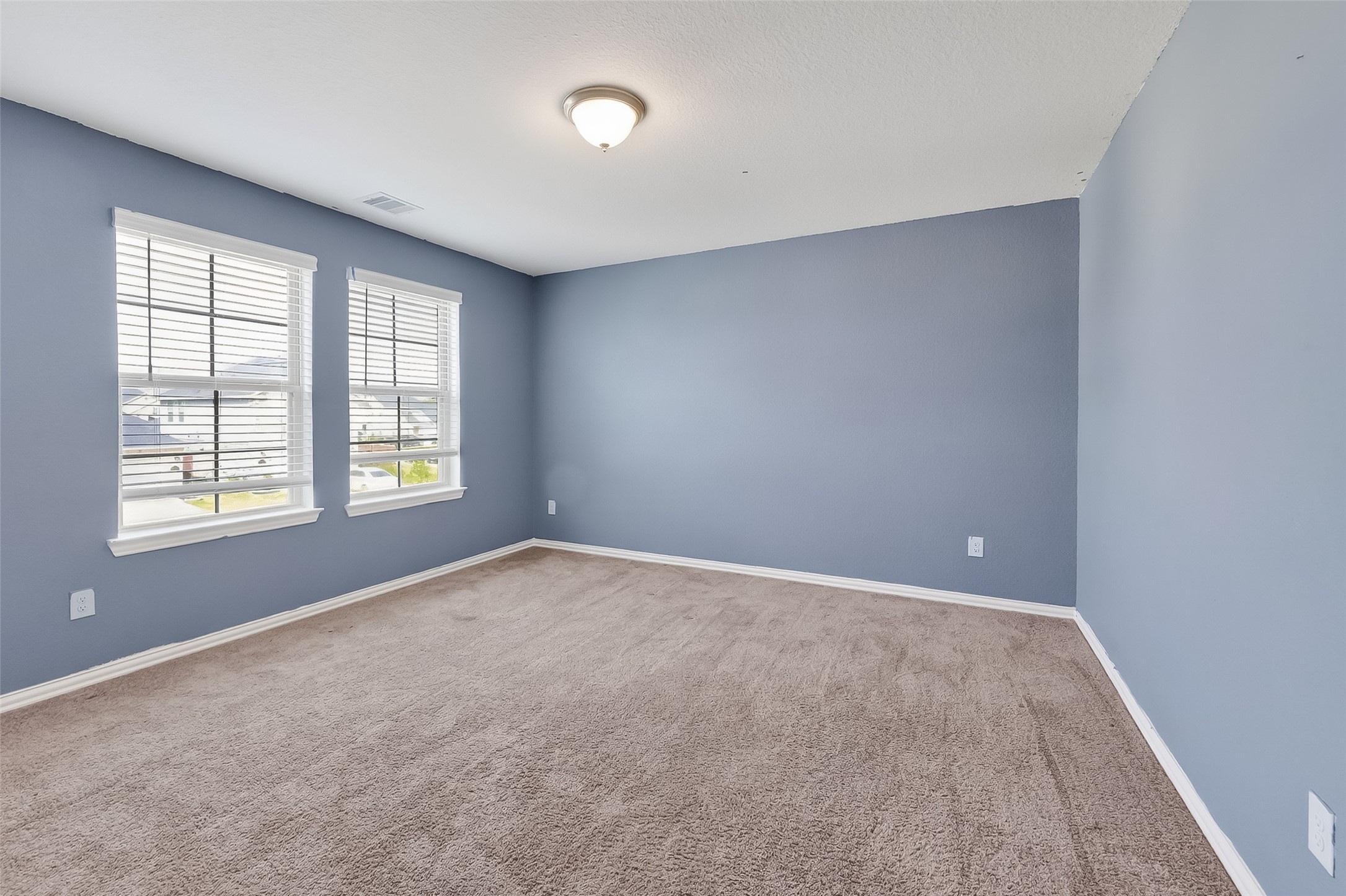 31215 Conover Drive Fulshear, TX 77441 - Photo 31 of 42 an empty room with windows