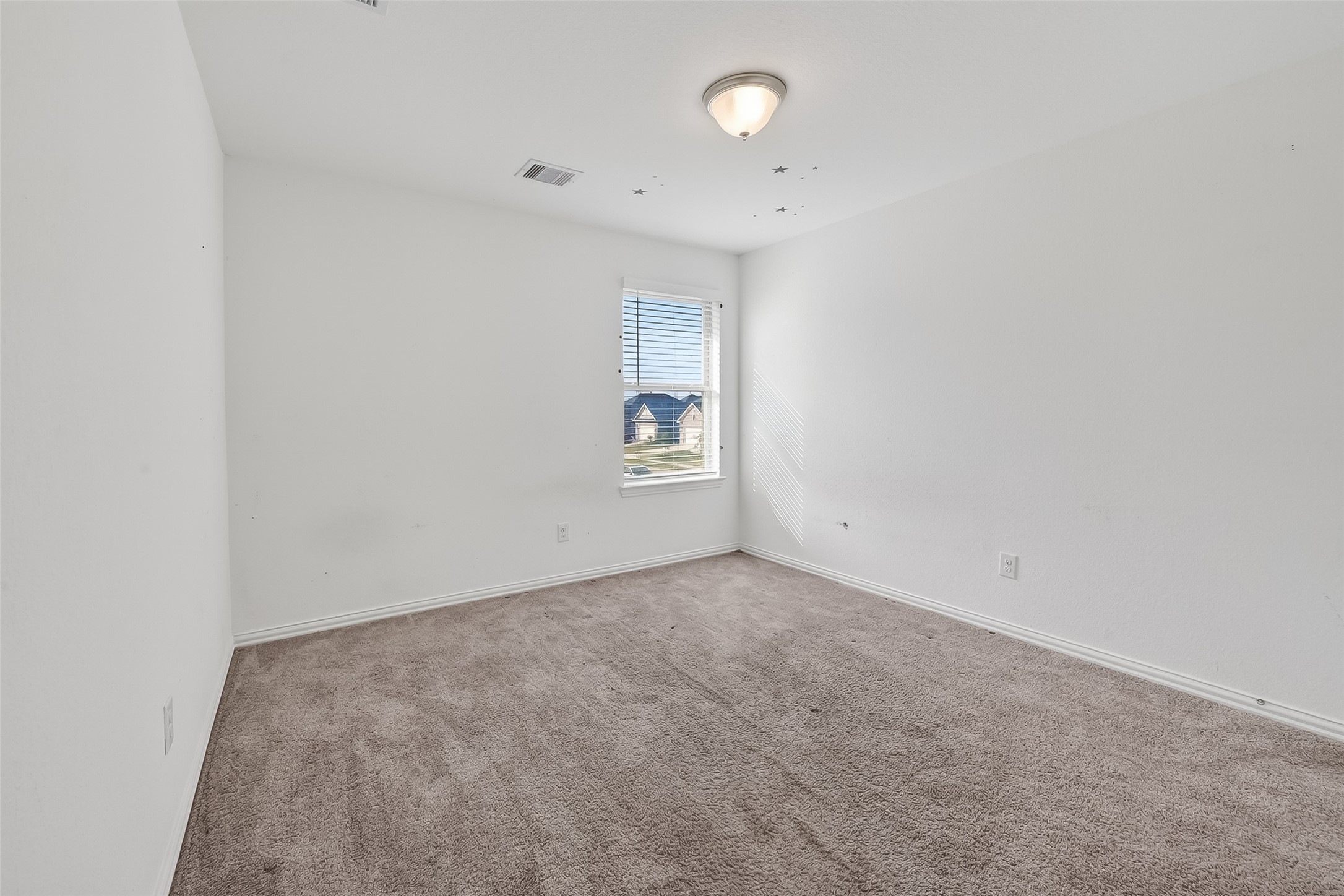 31215 Conover Drive Fulshear, TX 77441 - Photo 34 of 42 an empty room with windows