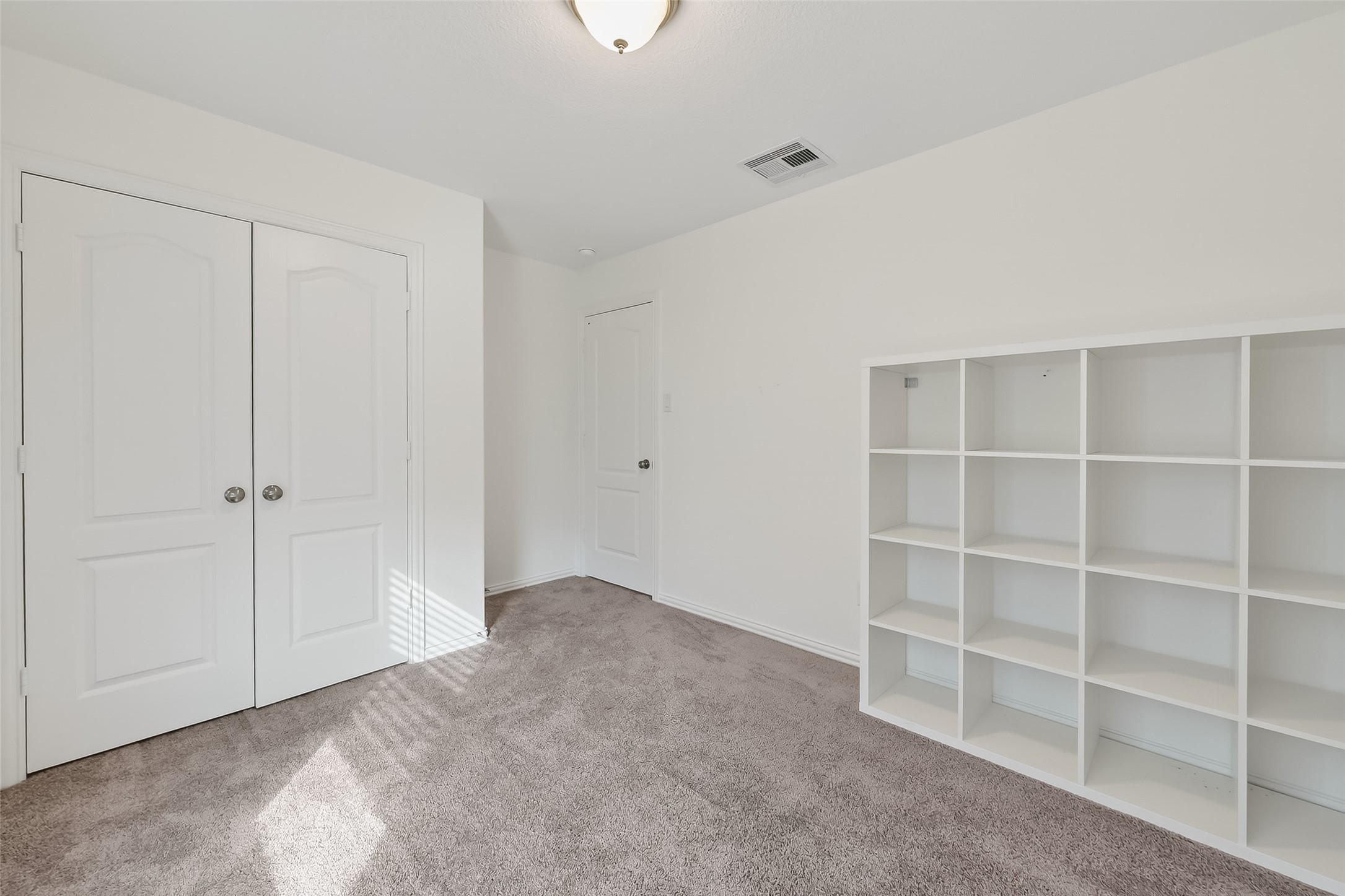 31215 Conover Drive Fulshear, TX 77441 - Photo 37 of 42 a view of an empty room with a closet