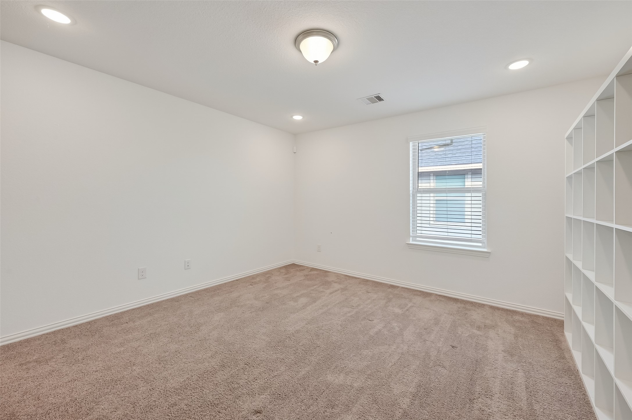 31215 Conover Drive Fulshear, TX 77441 - Photo 39 of 42 an empty room with windows