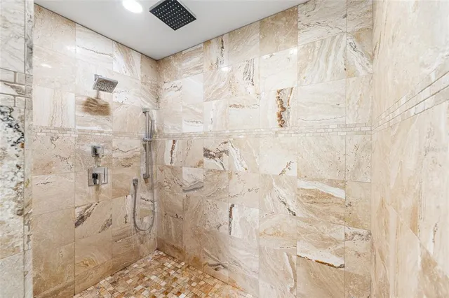 a bathroom with a sink toilet and a mirror