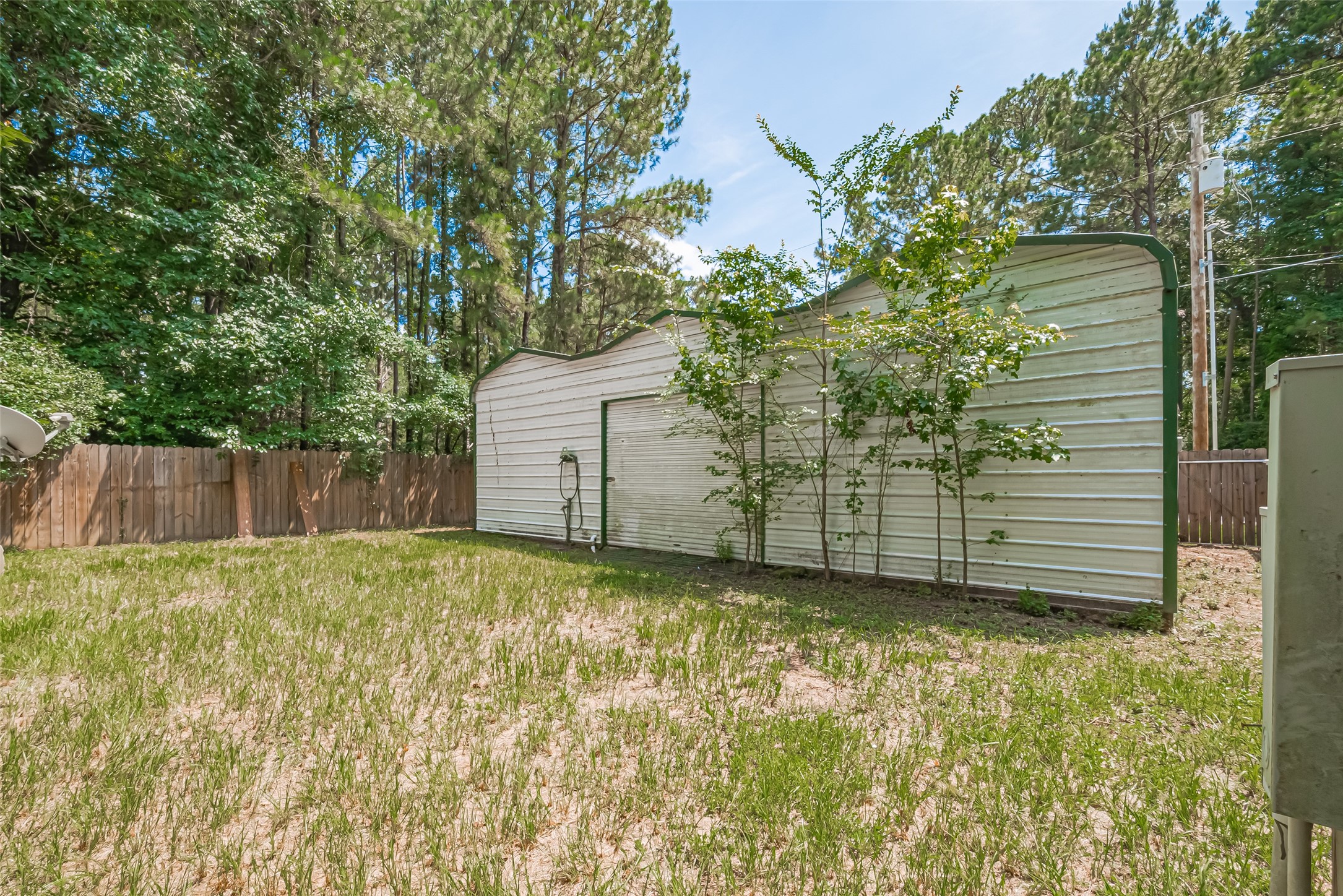 477 Canadian Drive Trinity, TX 75862 - Photo 10 of 11 a view of a backyard