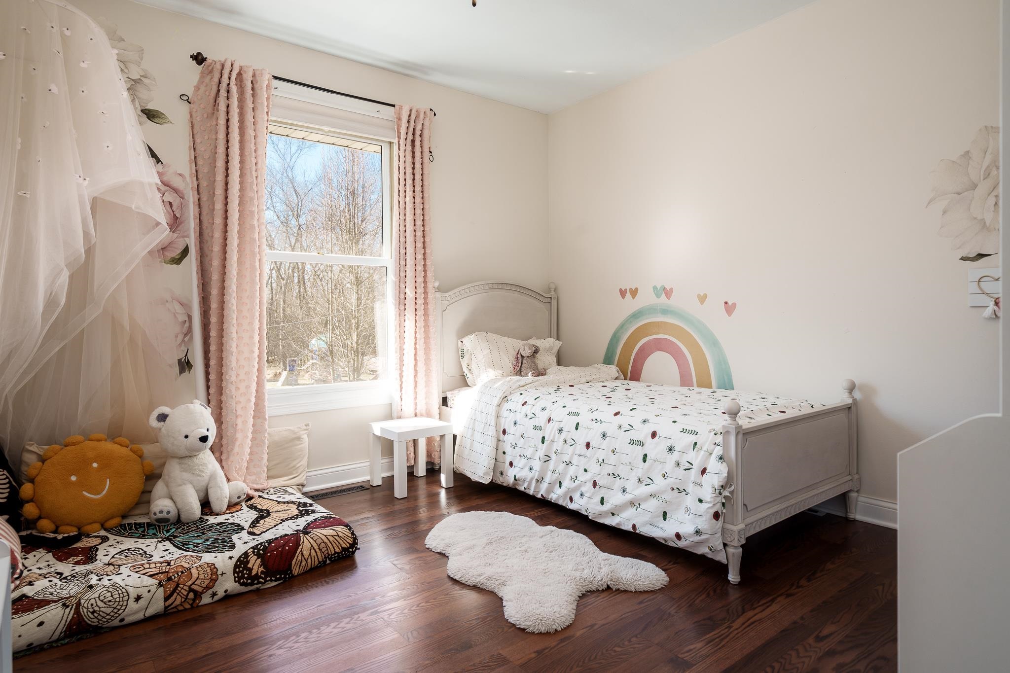651 Genoa Street Cherry Valley, IL 61016 - Photo 11 of 70 a bedroom with bed and wooden floor