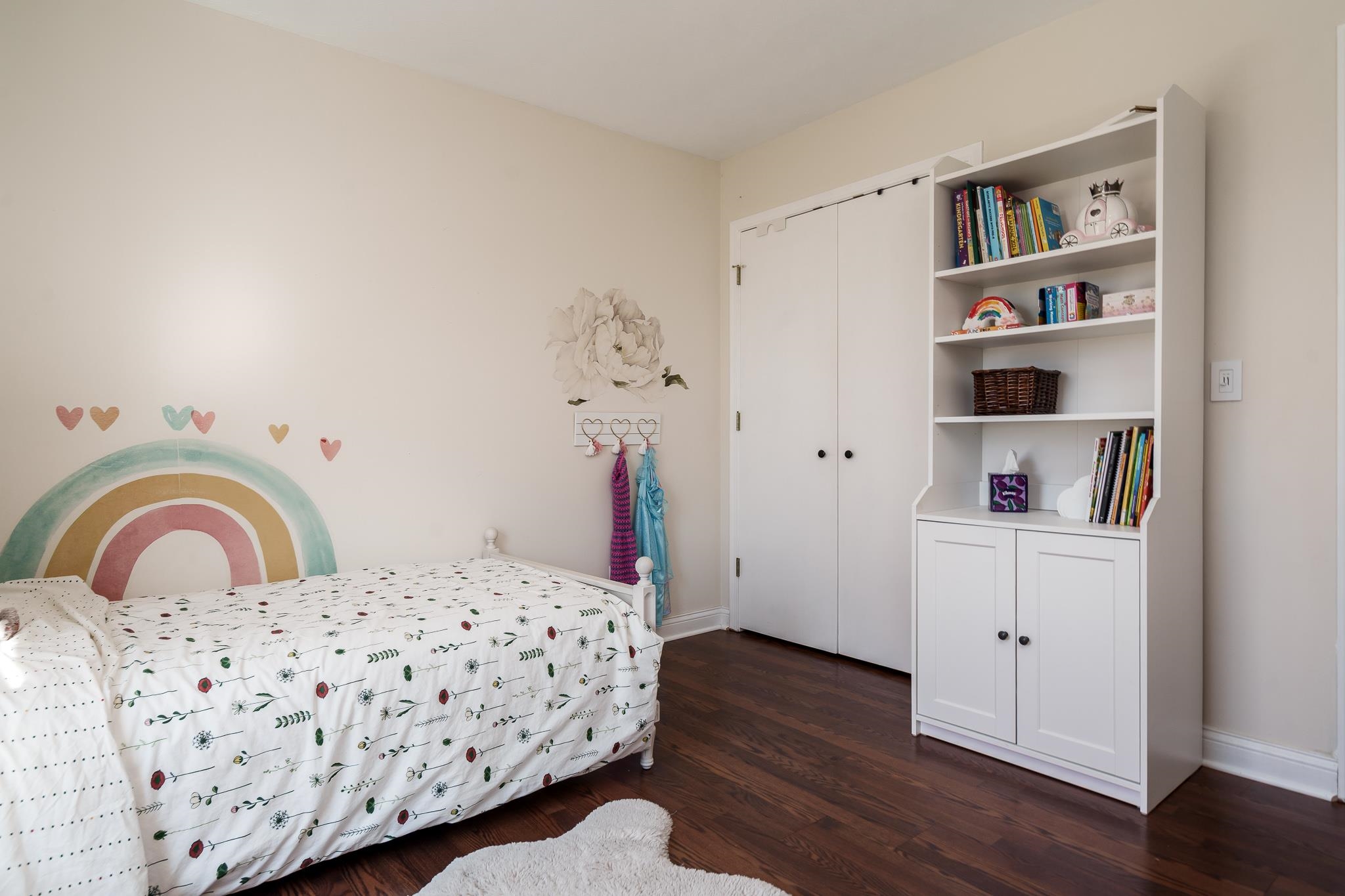 651 Genoa Street Cherry Valley, IL 61016 - Photo 12 of 70 a bedroom with a bed and a dresser