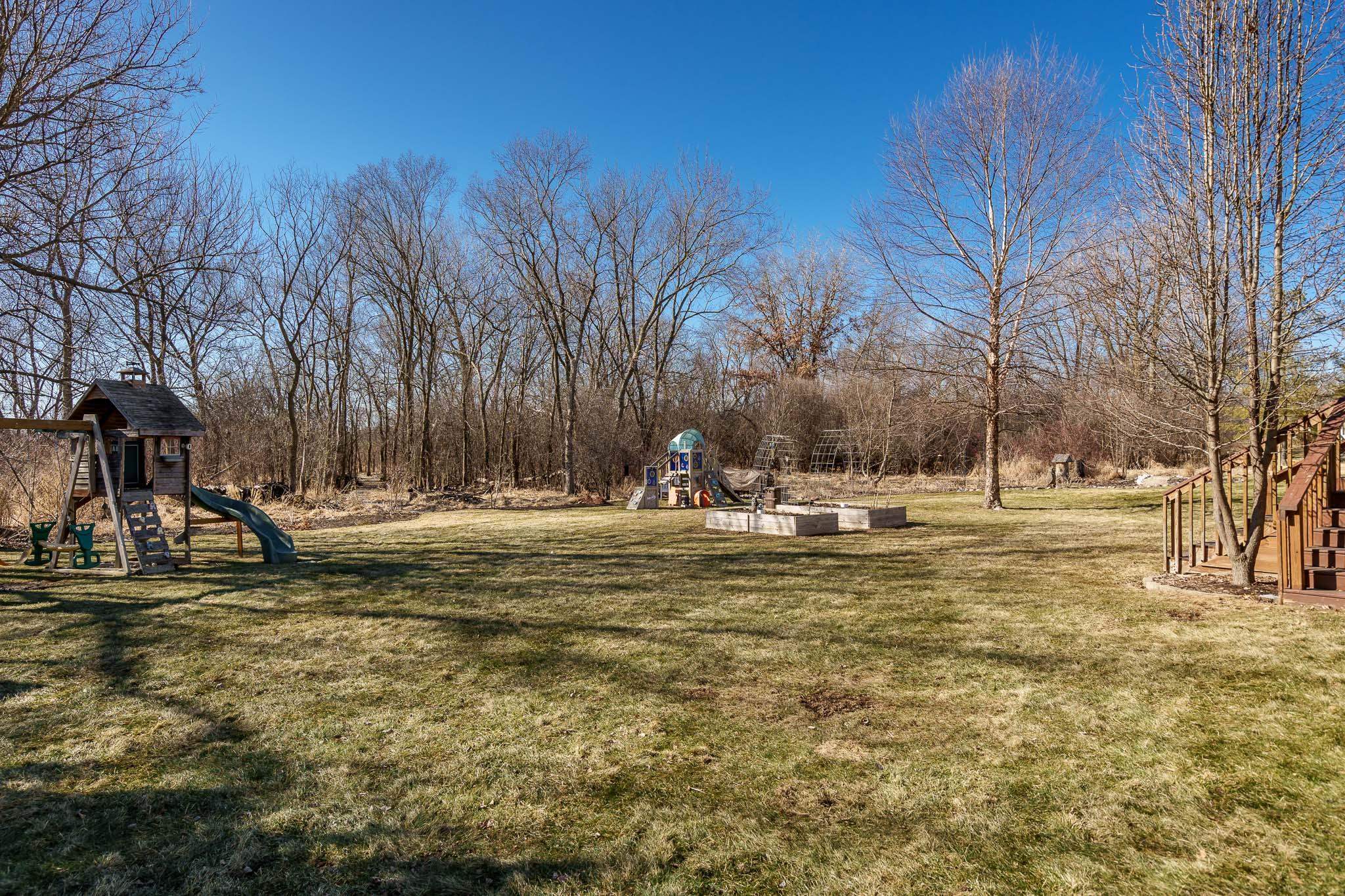651 Genoa Street Cherry Valley, IL 61016 - Photo 13 of 70 a view of yard with trees