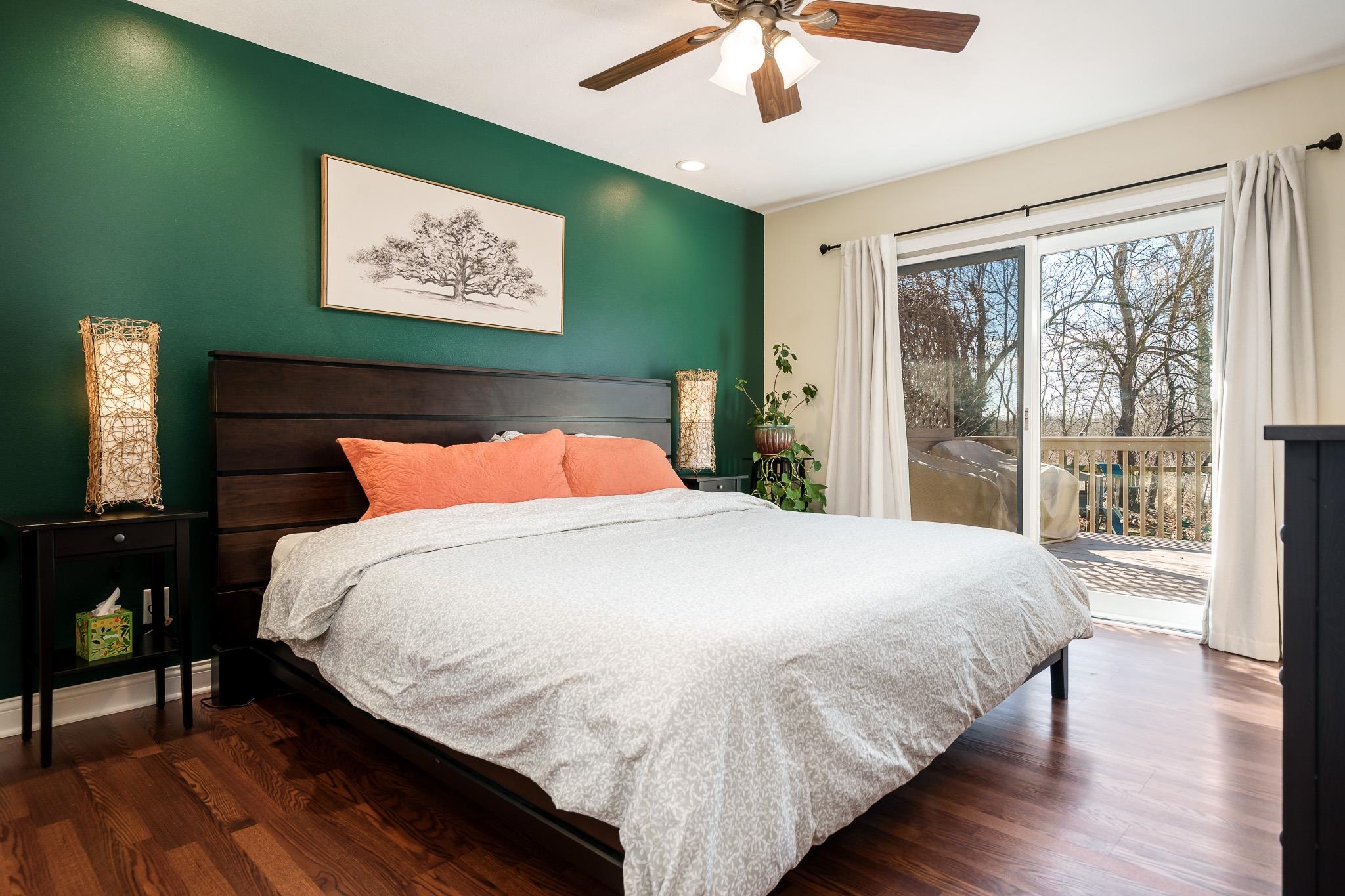 651 Genoa Street Cherry Valley, IL 61016 - Photo 14 of 70 a large bed sitting in a bedroom next to a window