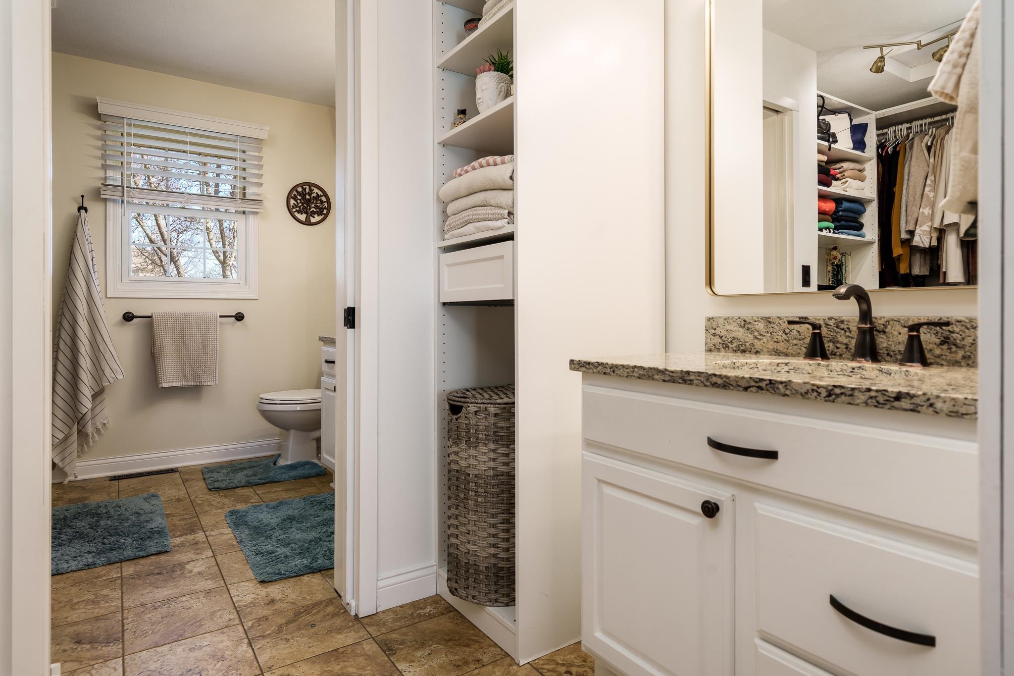 651 Genoa Street Cherry Valley, IL 61016 - Photo 17 of 70 a bathroom with a sink and a mirror