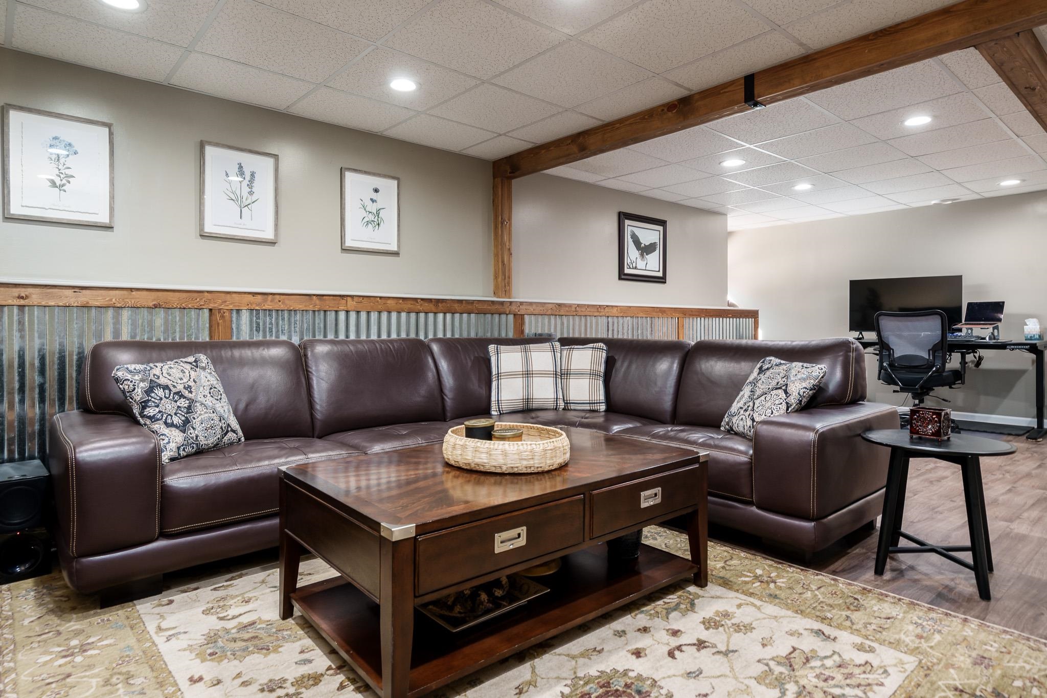 651 Genoa Street Cherry Valley, IL 61016 - Photo 22 of 70 a living room with furniture and a wooden floor