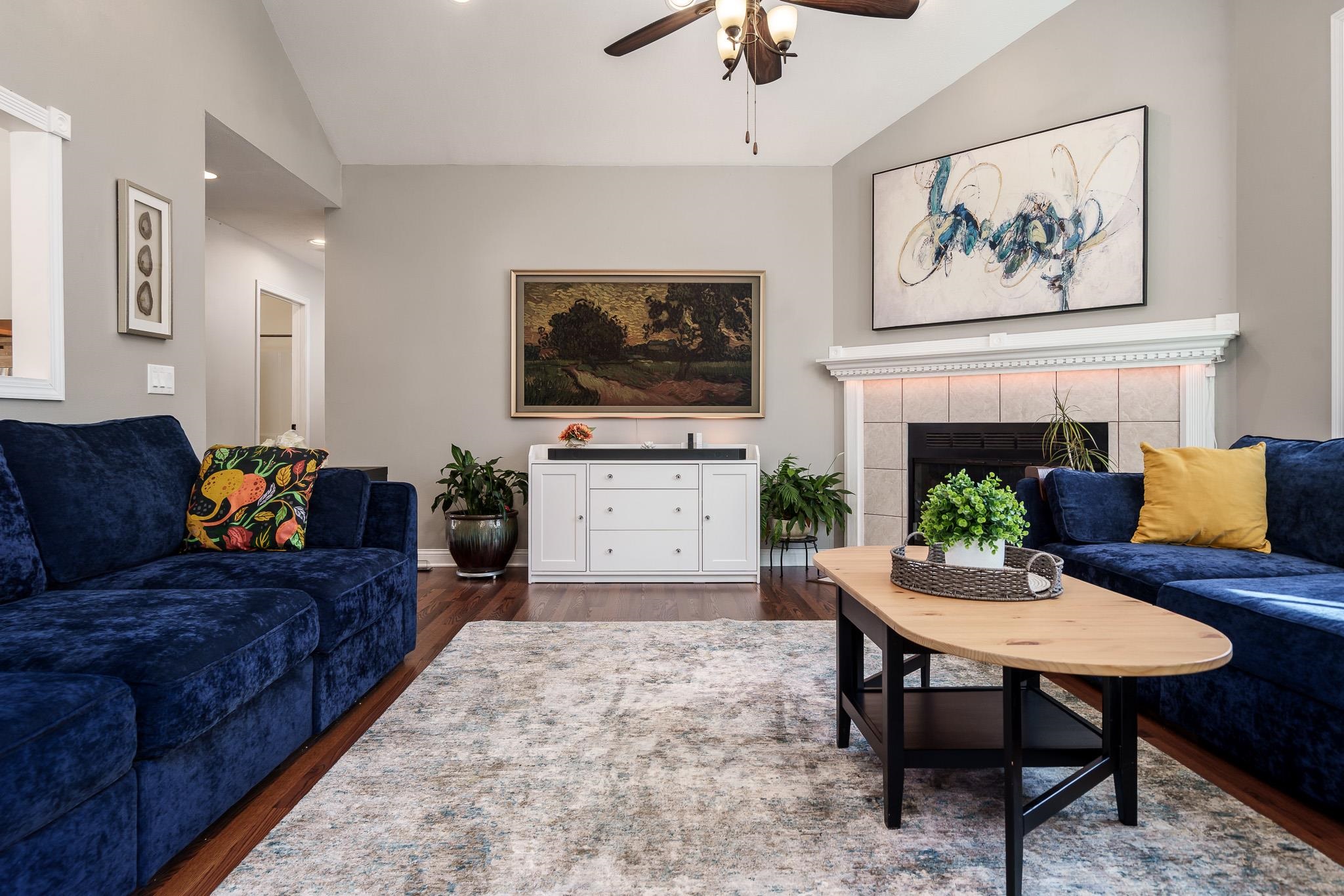 651 Genoa Street Cherry Valley, IL 61016 - Photo 28 of 70 a living room with furniture a fireplace and flat screen tv